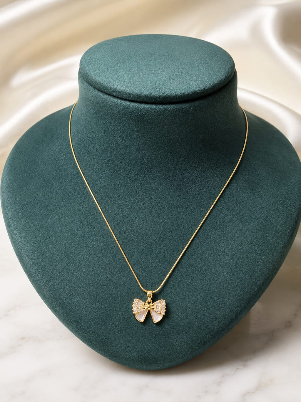 The Celeste Bow Pendant